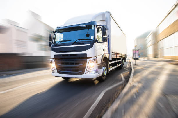 white truck in motion isolated with clipping path